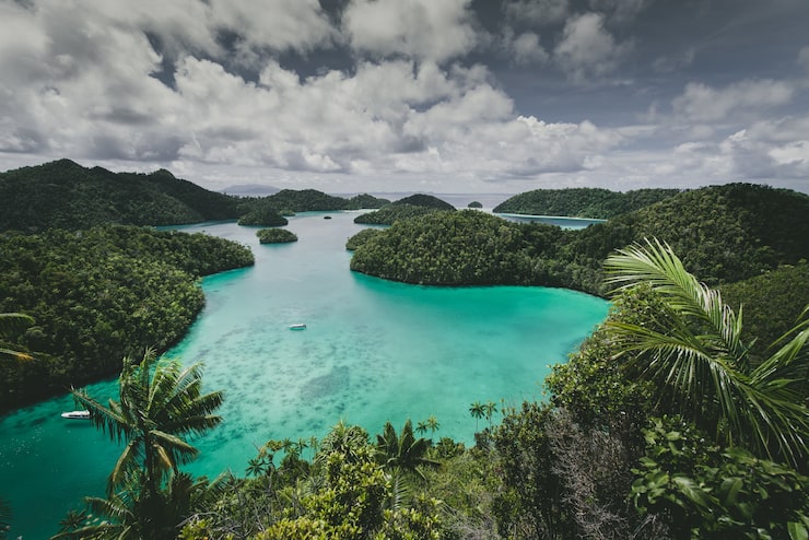 Visa & Travel Services landscape wajag island surrounded by sea cloudy sky indonesia_181624 39477